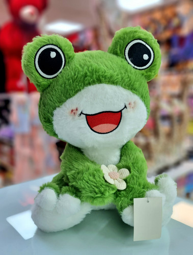 عروسک قورباغه خندان طرح گل بدست